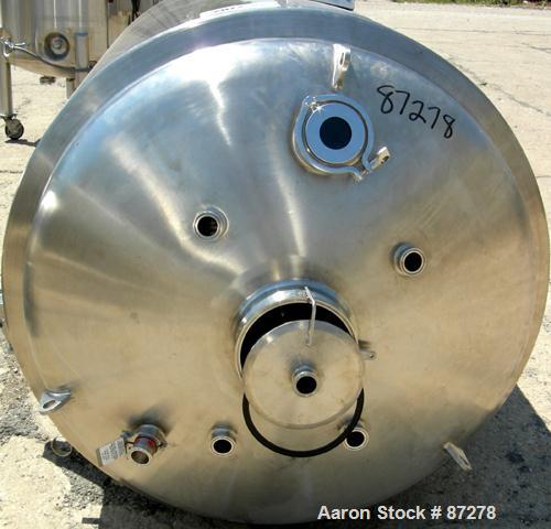 USED: T&C stainless pressure tank, 1000 liter (264 gallon), 316L stainless steel, vertical. 40" diameter x 48" straight side. Dished top and bottom. Internal rated 50 psi/FV at 301 deg F. 304 stainle...