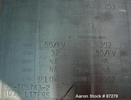 USED: T&C stainless pressure tank, 1000 liter (264 gallon), 316L stainless steel, vertical. 40" diameter x 48" straight side. Dished top and bottom. Internal rated 50 psi/FV at 301 deg F. 304 stainle...
