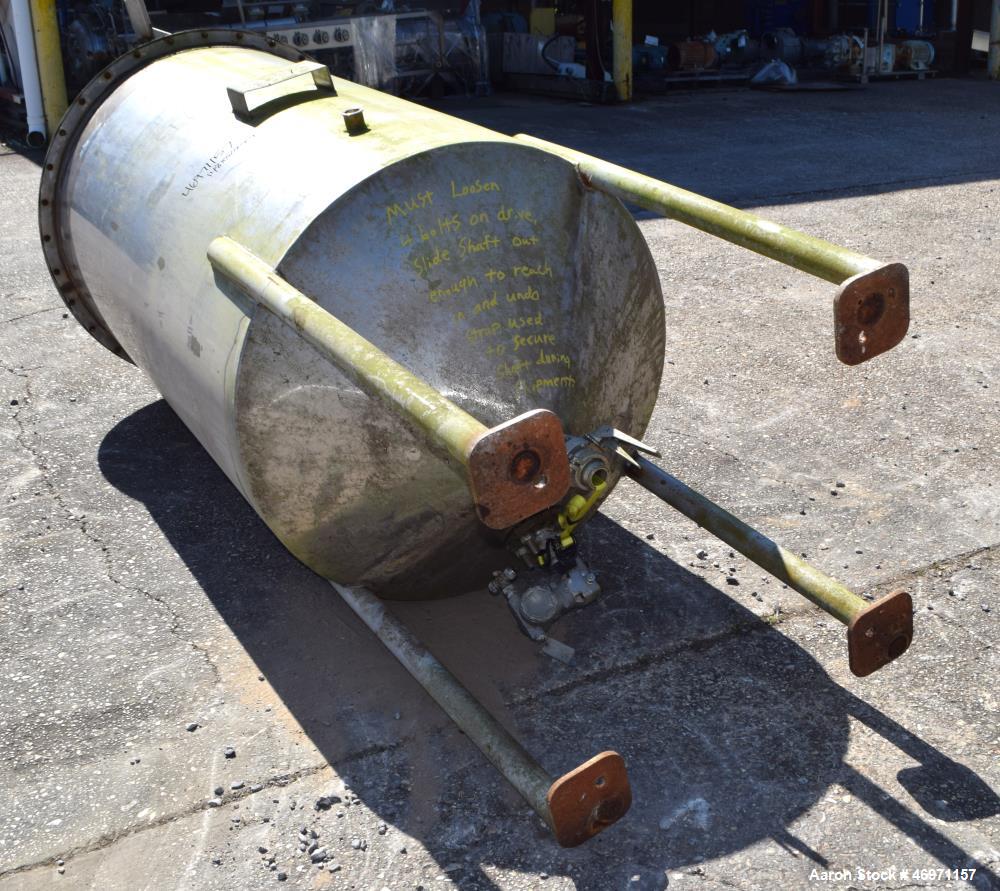 Used Thibs Machine & Welding Tank, 438 Gallon, 316 Stainless Steel, Vertical. Approximate 42" diameter x 69" straight side, flat bolt on top, coned bottom. Internal rated to 200 degrees F. Top enteri...