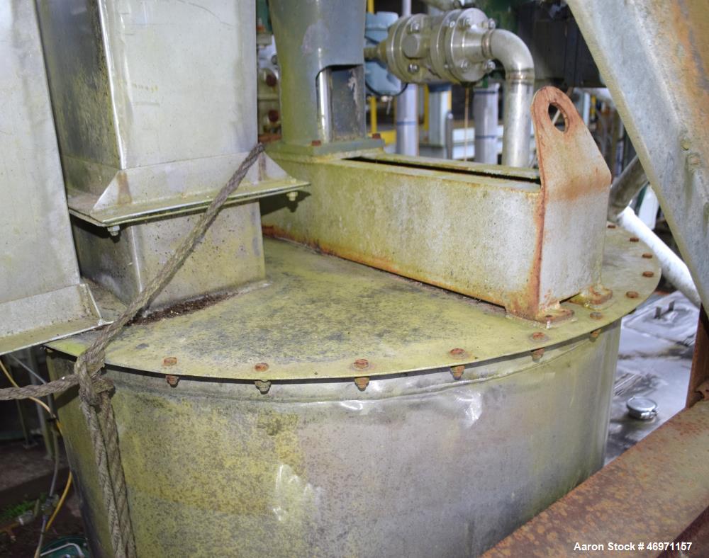 Used Thibs Machine & Welding Tank, 438 Gallon, 316 Stainless Steel, Vertical. Approximate 42" diameter x 69" straight side, flat bolt on top, coned bottom. Internal rated to 200 degrees F. Top enteri...