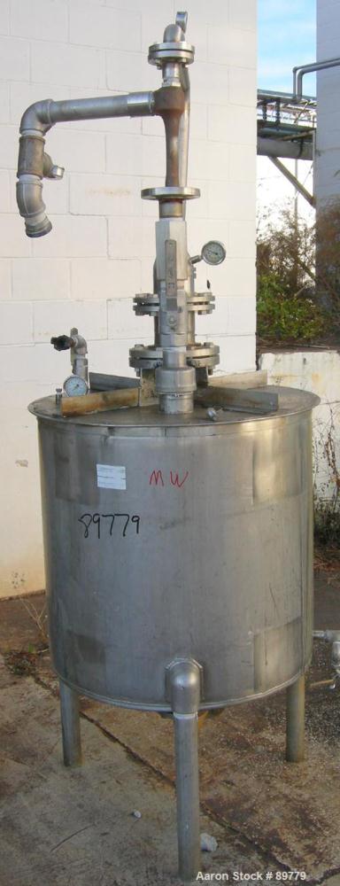 USED: Approximate 100 gallon, 304 stainless steel, tank. 29" diameter x 29" straight side. Cone bottom, flat top. Built by United Utensils, model FVT. Welded top cover, 6" top opening, 2" center bott...