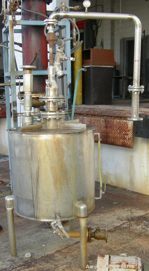 USED: Approximate 100 gallon, 304 stainless steel, tank. 29" diameter x 29" straight side. Cone bottom, flat top. Built by United Utensils, model FVT. Welded top cover, 6" top opening, 2" center bott...