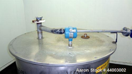 Used United Utensils Tank, 300 Gallon, Model VT-300, 304 Stainless Steel, Vertical. Approximate 45" diameter x 47" straight side. Flat top with a bolt on 1 piece cover, flat bottom. 2" Off center bot...