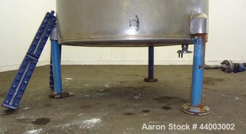 Used United Utensils Tank, 300 Gallon, Model VT-300, 304 Stainless Steel, Vertical. Approximate 45" diameter x 47" straight side. Flat top with a bolt on 1 piece cover, flat bottom. 2" Off center bot...
