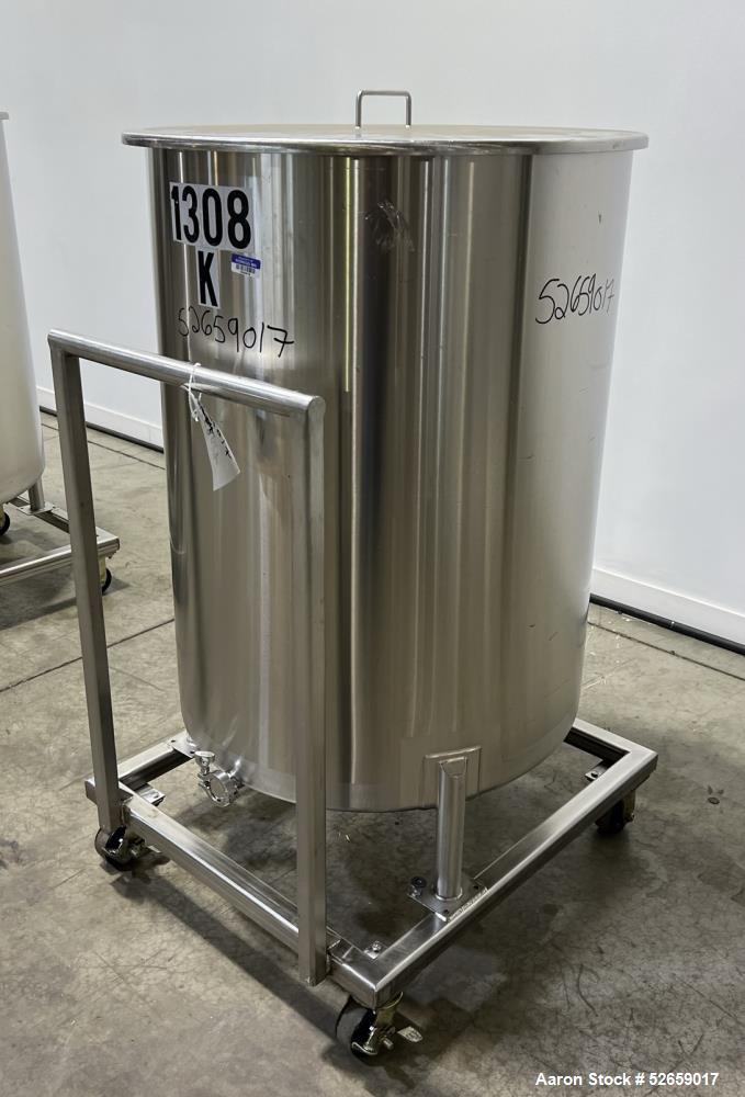 Used Stainless Steel Tank, Approximate 140 Gallon, Vertical. Approximate 32" diameter x 40" straight side. Flat top with cover, slight sloped bottom. 1-1/2" side bottom outlet, 13" discharge height. ...
