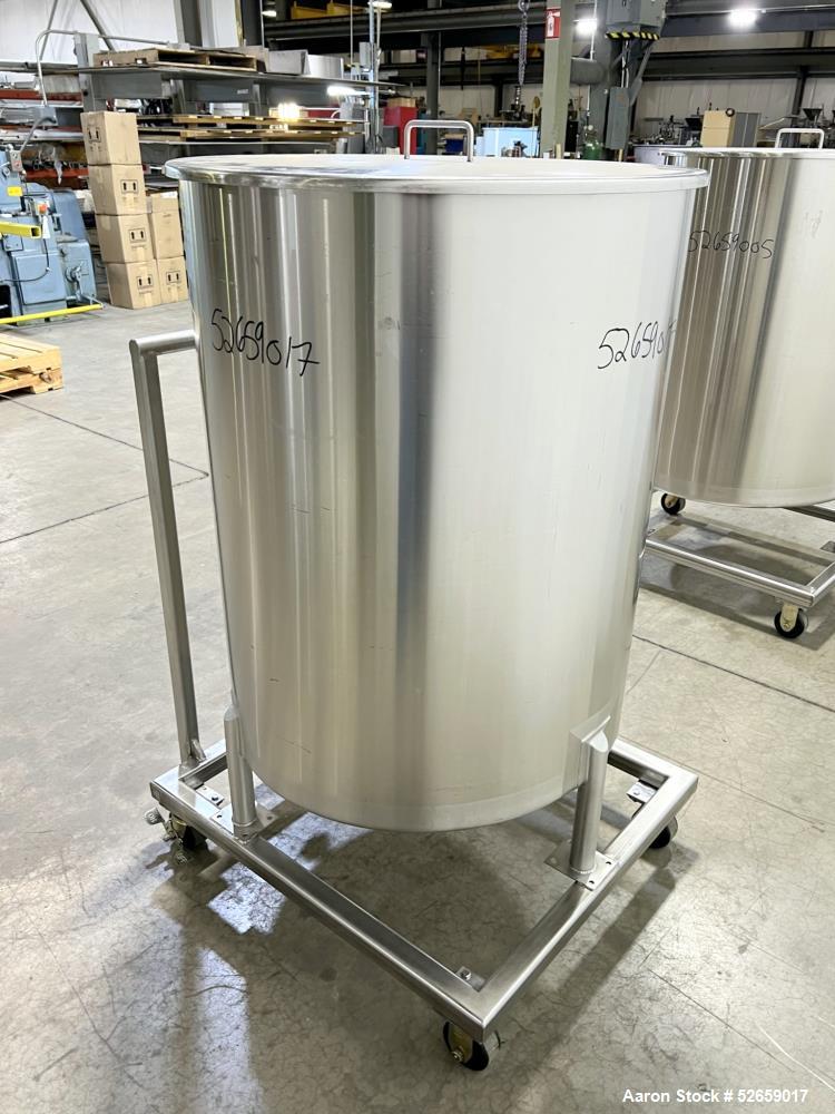 Used Stainless Steel Tank, Approximate 140 Gallon, Vertical. Approximate 32" diameter x 40" straight side. Flat top with cover, slight sloped bottom. 1-1/2" side bottom outlet, 13" discharge height. ...