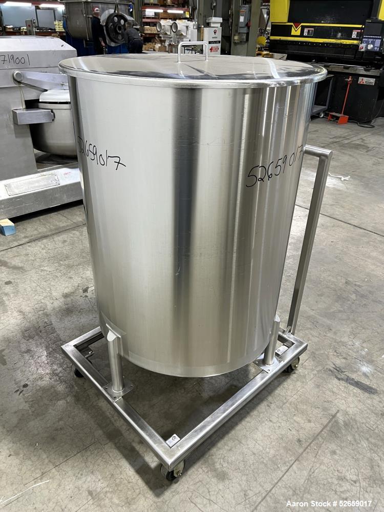 Used Stainless Steel Tank, Approximate 140 Gallon, Vertical. Approximate 32" diameter x 40" straight side. Flat top with cover, slight sloped bottom. 1-1/2" side bottom outlet, 13" discharge height. ...