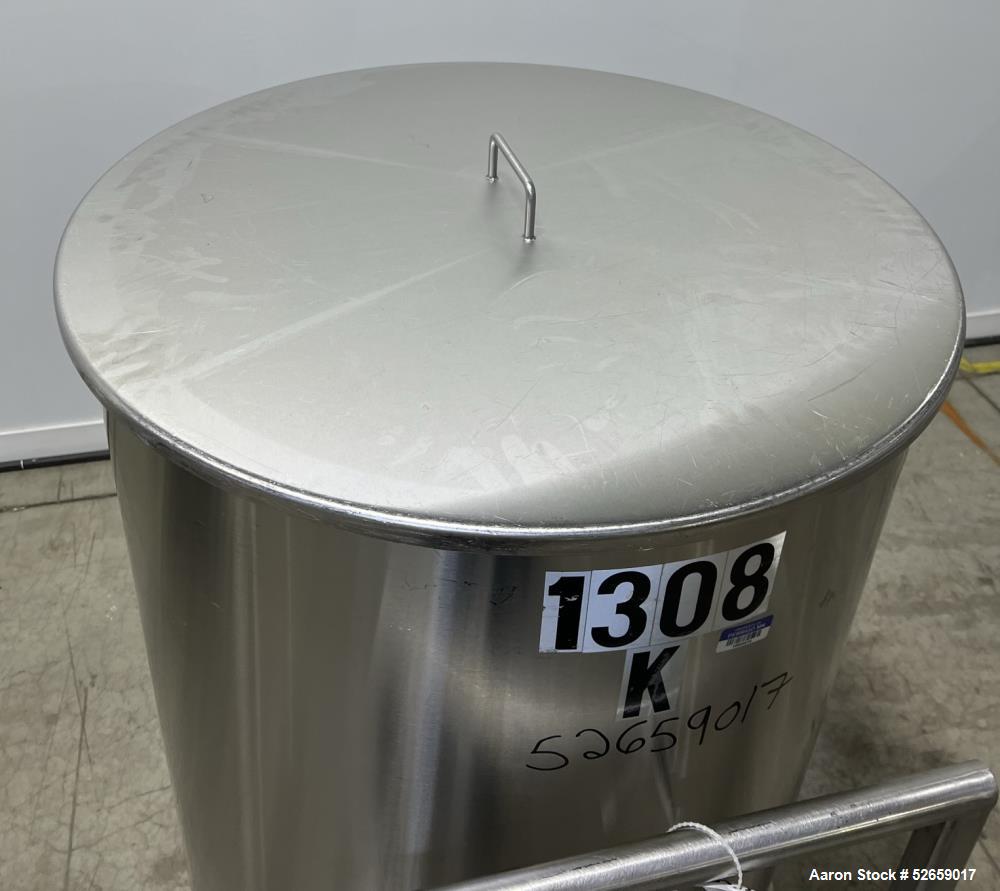 Used Stainless Steel Tank, Approximate 140 Gallon, Vertical. Approximate 32" diameter x 40" straight side. Flat top with cover, slight sloped bottom. 1-1/2" side bottom outlet, 13" discharge height. ...
