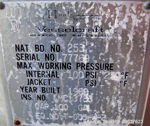 Used Vesselcraft pressure tank, 100 gallon, stainless steel, vertical. 36" diameter x 20" straight side, dished top and bottom. Internal rated 100 psi at 250 deg.f.. Opening top 2", 8" hand hole. 1 1...