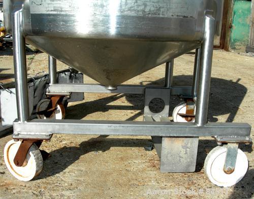 USED: Walker Tank, 100 gallon, 304 stainless steel, vertical. 42" diameter x 16" straight side. Dished top, coned bottom. Openings: top 2" tri clamp, (2) 1-1/2" tri clamp; 2" tri clamp center bottom ...