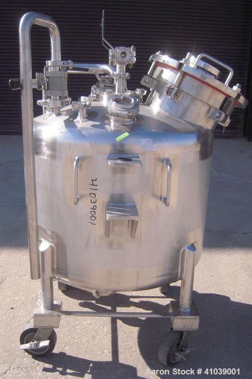 Used Walker Stainless Pressure Tank, 52.8 gallon (200 liter), 316L stainless steel, vertical. 30'' diameter x 18'' straight side, dished top and bottom. Polished Internal rated full vacuum and 35 psi...