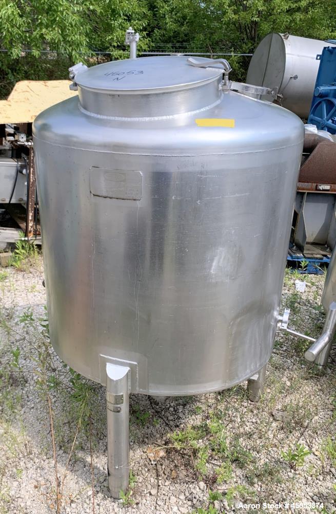 Used Walker 135 Gallon Stainless Steel Tank, Model SB-V-52, 304 Stainless Steel, Vertical. Approximate 36" diameter x 30" straight side. Dished top, sloped bottom. Openings: 16" manway with cover, 4"...