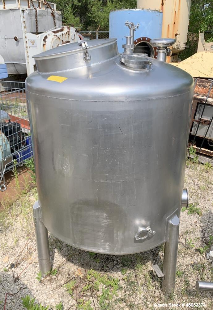 Used Walker 135 Gallon Stainless Steel Tank, Model SB-V-52, 304 Stainless Steel, Vertical. Approximate 36" diameter x 30" straight side. Dished top, sloped bottom. Openings: 16" manway with cover, 4"...