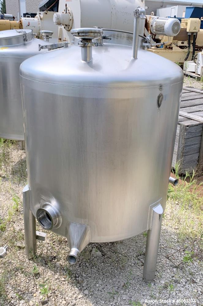 Used Walker 135 Gallon Stainless Steel Tank, Model SB-V-52, 304 Stainless Steel, Vertical. Approximate 36" diameter x 30" straight side. Dished top, sloped bottom. Openings: 16" manway with cover, 4"...