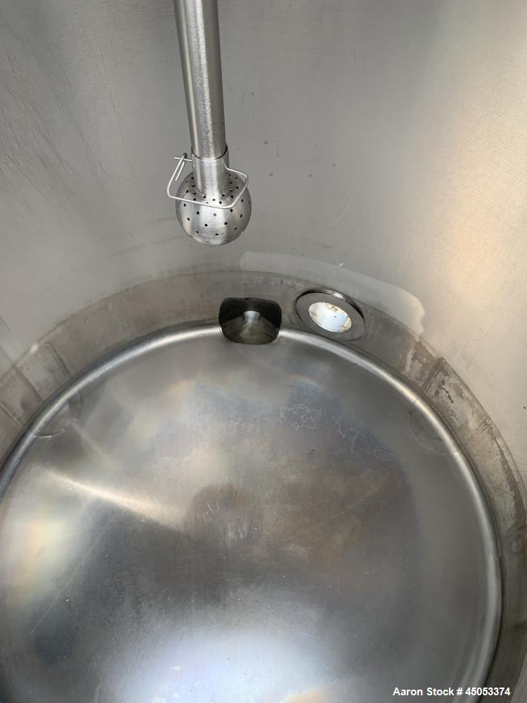 Used Walker 135 Gallon Stainless Steel Tank, Model SB-V-52, 304 Stainless Steel, Vertical. Approximate 36" diameter x 30" straight side. Dished top, sloped bottom. Openings: 16" manway with cover, 4"...