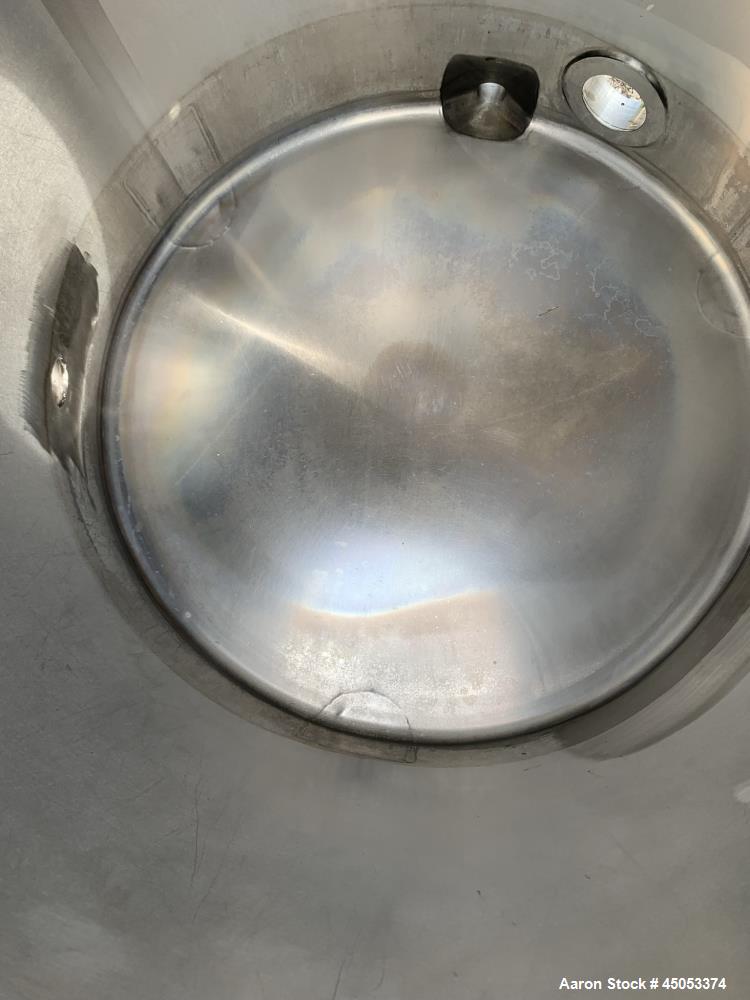 Used Walker 135 Gallon Stainless Steel Tank, Model SB-V-52, 304 Stainless Steel, Vertical. Approximate 36" diameter x 30" straight side. Dished top, sloped bottom. Openings: 16" manway with cover, 4"...
