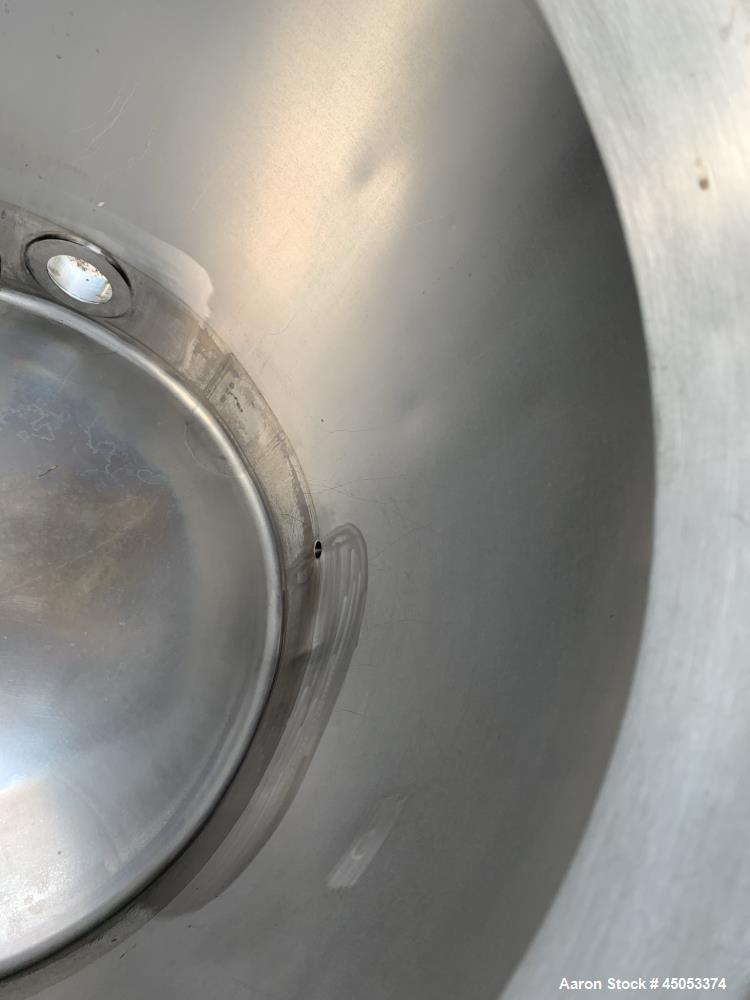 Used Walker 135 Gallon Stainless Steel Tank, Model SB-V-52, 304 Stainless Steel, Vertical. Approximate 36" diameter x 30" straight side. Dished top, sloped bottom. Openings: 16" manway with cover, 4"...