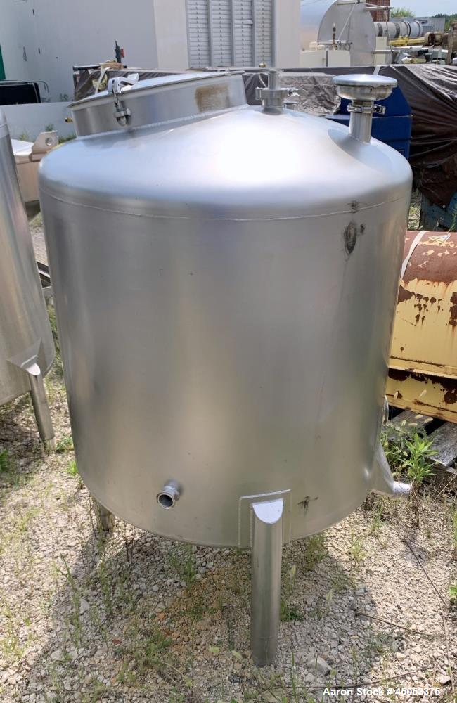Used Walker 135 Gallon Stainless Steel Tank, Model SB-V-52, 304 Stainless Steel, Vertical. Approximate 36" diameter x 30" straight side. Dished top, sloped bottom. Openings: 16" manway with cover, 4"...