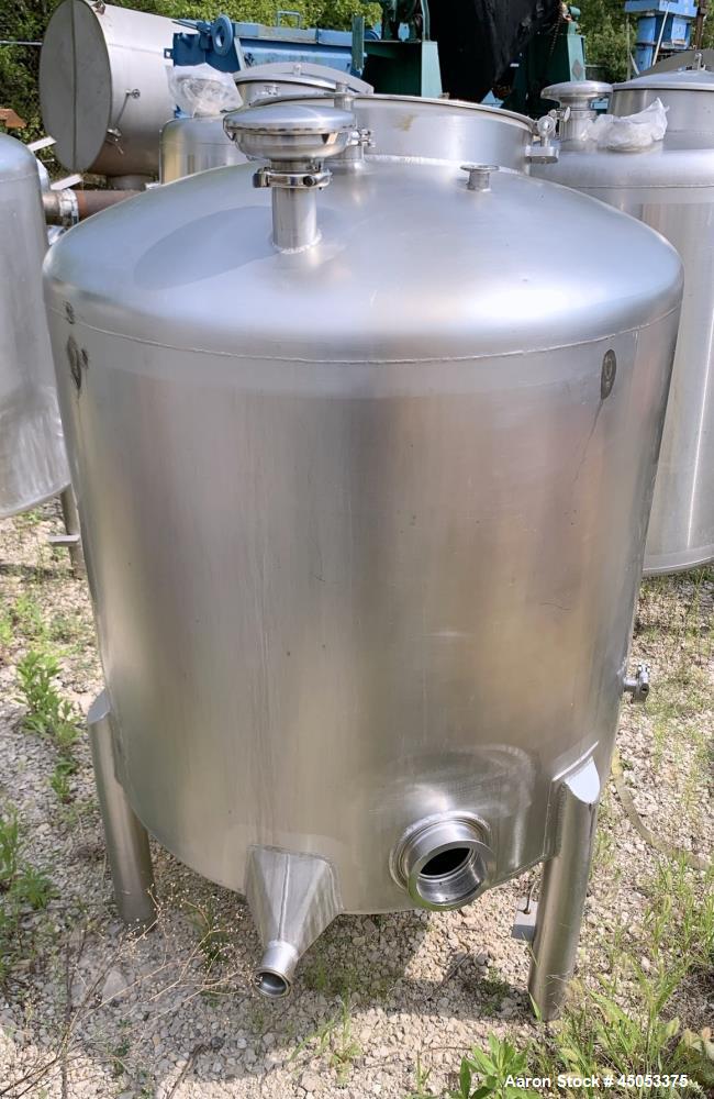Used Walker 135 Gallon Stainless Steel Tank, Model SB-V-52, 304 Stainless Steel, Vertical. Approximate 36" diameter x 30" straight side. Dished top, sloped bottom. Openings: 16" manway with cover, 4"...