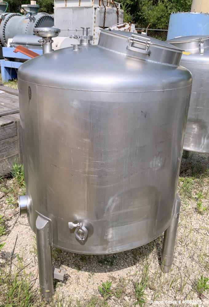 Used Walker 135 Gallon Stainless Steel Tank, Model SB-V-52, 304 Stainless Steel, Vertical. Approximate 36" diameter x 30" straight side. Dished top, sloped bottom. Openings: 16" manway with cover, 4"...