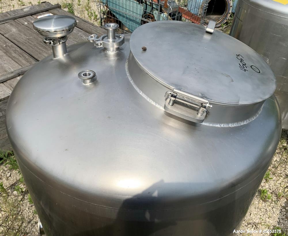 Used Walker 135 Gallon Stainless Steel Tank, Model SB-V-52, 304 Stainless Steel, Vertical. Approximate 36" diameter x 30" straight side. Dished top, sloped bottom. Openings: 16" manway with cover, 4"...
