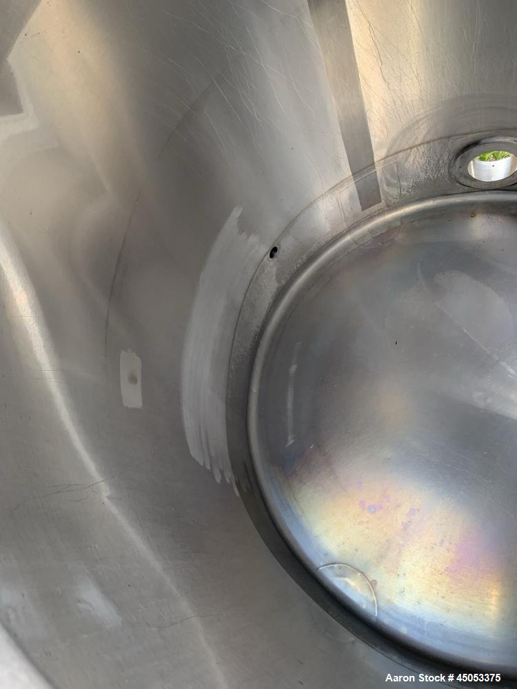 Used Walker 135 Gallon Stainless Steel Tank, Model SB-V-52, 304 Stainless Steel, Vertical. Approximate 36" diameter x 30" straight side. Dished top, sloped bottom. Openings: 16" manway with cover, 4"...