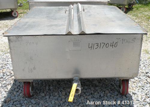 Used Walker Stainless Tank, 120 Gallon, Model SP-7144, 316L Stainless Steel. 50" long x 40" wide x 15" deep. 2 piece hinged top cover. 2" NPT end bottom outlet. Mounted on casters.