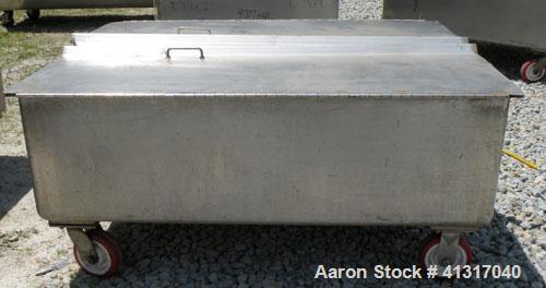 Used Walker Stainless Tank, 120 Gallon, Model SP-7144, 316L Stainless Steel. 50" long x 40" wide x 15" deep. 2 piece hinged top cover. 2" NPT end bottom outlet. Mounted on casters.