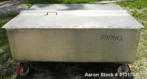 Used Walker Stainless Tank, 120 Gallon, Model SP-7144, 316L Stainless Steel. 50" long x 40" wide x 15" deep. 2 piece hinged top cover. 2" NPT end bottom outlet. Mounted on casters.