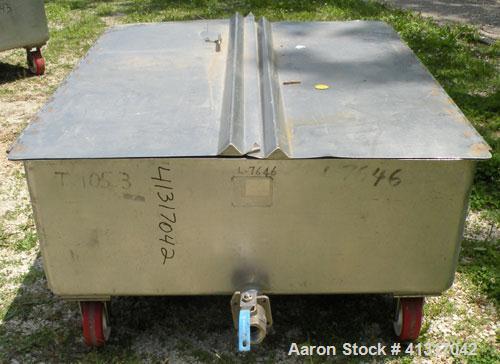Used Walker Stainless Tank, 120 Gallon, Model SP-7144, 316L Stainless Steel. 50" long x 40" wide x 15" deep. 2 piece hinged top cover. 2" NPT end bottom outlet. Mounted on casters.