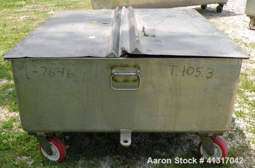 Used Walker Stainless Tank, 120 Gallon, Model SP-7144, 316L Stainless Steel. 50" long x 40" wide x 15" deep. 2 piece hinged top cover. 2" NPT end bottom outlet. Mounted on casters.
