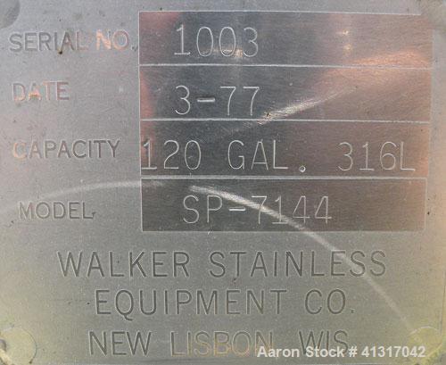 Used Walker Stainless Tank, 120 Gallon, Model SP-7144, 316L Stainless Steel. 50" long x 40" wide x 15" deep. 2 piece hinged top cover. 2" NPT end bottom outlet. Mounted on casters.