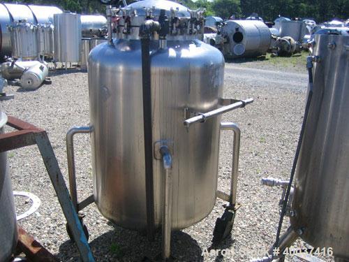 Used Walker Stainless Pressure Tank, 150 gallon, 316 L stainless steel, vertical. 34'' diameter x 39'' straight side, dished top and bottom. Internal rated FV/120 psi at 300 deg F. Openings: top 18''...