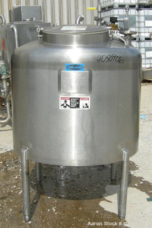 Used Walker Tank, 100 Gallon, 316L Stainless Steel, Vertical. 36" diameter x 27" straight side, dished top, sloped bottom. Internal rated to 250 deg F. Openings: top (3) 1" tri-clamp, 2" tri-clamp, 1...