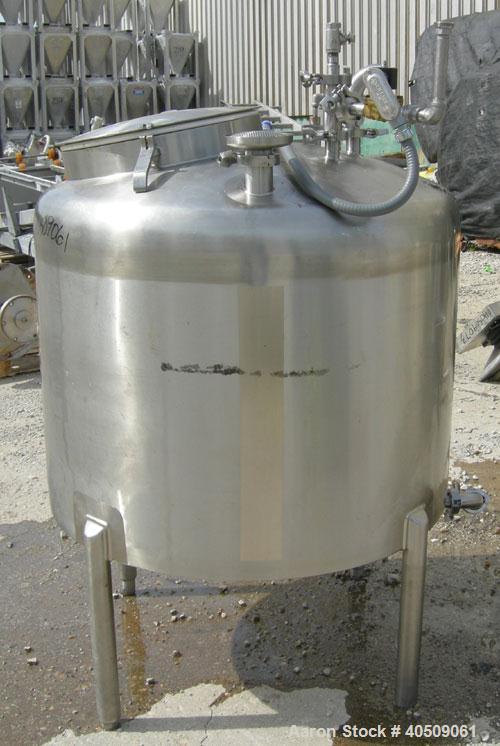 Used Walker Tank, 100 Gallon, 316L Stainless Steel, Vertical. 36" diameter x 27" straight side, dished top, sloped bottom. Internal rated to 250 deg F. Openings: top (3) 1" tri-clamp, 2" tri-clamp, 1...