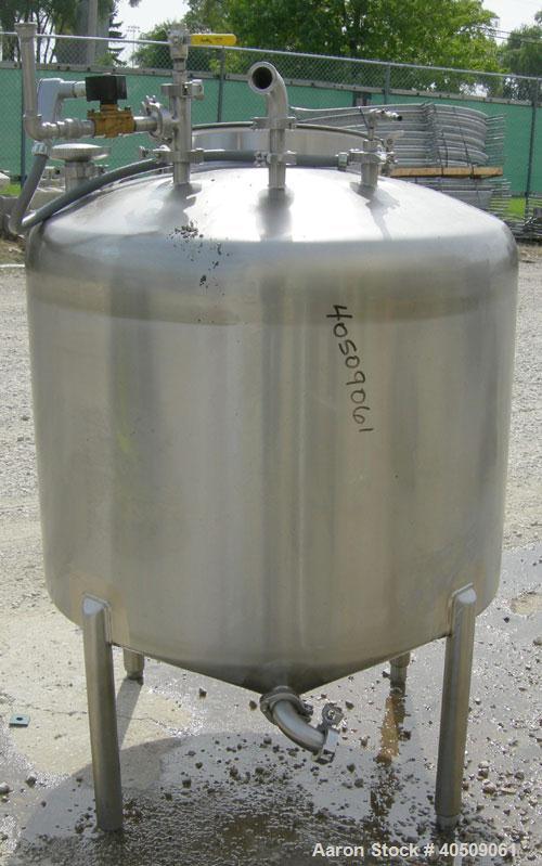 Used Walker Tank, 100 Gallon, 316L Stainless Steel, Vertical. 36" diameter x 27" straight side, dished top, sloped bottom. Internal rated to 250 deg F. Openings: top (3) 1" tri-clamp, 2" tri-clamp, 1...