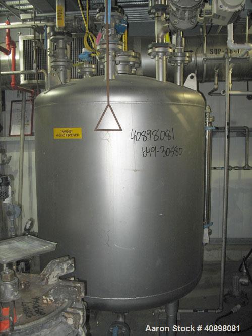 Used Walker Stainless Pressure Tank, 300 Gallon, 316L Stainless Steel, Vertical. 45" diameter x 43" straight side, dish top and bottom. Internal rated 54 psi at 300 deg.F. 2" center bottom outlet on ...