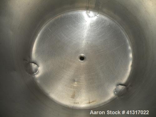 Used Walker Stainless Pressure Tank, 75 Gallon, 316 Stainless Steel, Vertical. 28" diameter x 26" straight side. Dish top and bottom. Internal rated 15 psi at 200 deg F and full vacuum. Openings: top...