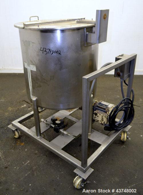 Used Walker Stainless Tank, 80 Gallon, 316 Stainless Steel, Vertical. 30” Diameter x 29” straight side. Open top with a 2 piece cover, coned bottom. Provision for a clamp-on agitator. 1-1/2” Tri-clam...