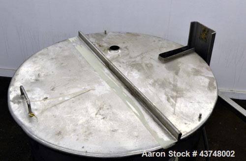 Used Walker Stainless Tank, 80 Gallon, 316 Stainless Steel, Vertical. 30” Diameter x 29” straight side. Open top with a 2 piece cover, coned bottom. Provision for a clamp-on agitator. 1-1/2” Tri-clam...