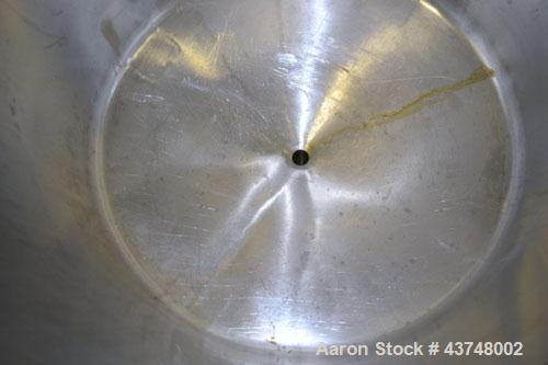 Used Walker Stainless Tank, 80 Gallon, 316 Stainless Steel, Vertical. 30” Diameter x 29” straight side. Open top with a 2 piece cover, coned bottom. Provision for a clamp-on agitator. 1-1/2” Tri-clam...