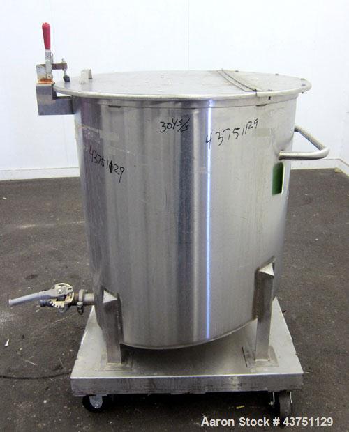 Used Water Cooling Corporation Tank, 100 Gallons, 304 Stainless Steel, Vertical. Approximately 31" diameter x 34" straight side.  Flat top with a bolt-on hinged cover, 6" sloped bottom.  2" Tri-clamp...