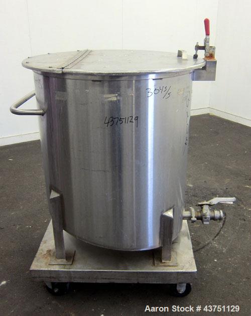 Used Water Cooling Corporation Tank, 100 Gallons, 304 Stainless Steel, Vertical. Approximately 31" diameter x 34" straight side.  Flat top with a bolt-on hinged cover, 6" sloped bottom.  2" Tri-clamp...