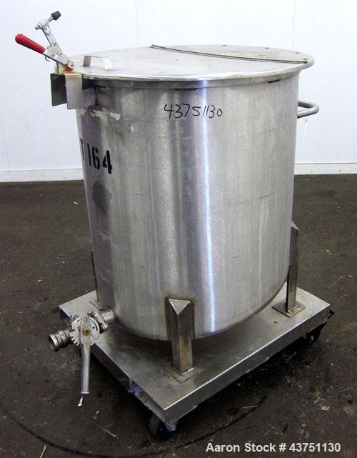 Used Water Cooling Corporation Tank, 100 Gallons, 304 Stainless Steel, Vertical. Approximately 31" diameter x 34" straight side.  Flat top with a bolt-on hinged cover, 6" sloped bottom.  2" Tri-clamp...