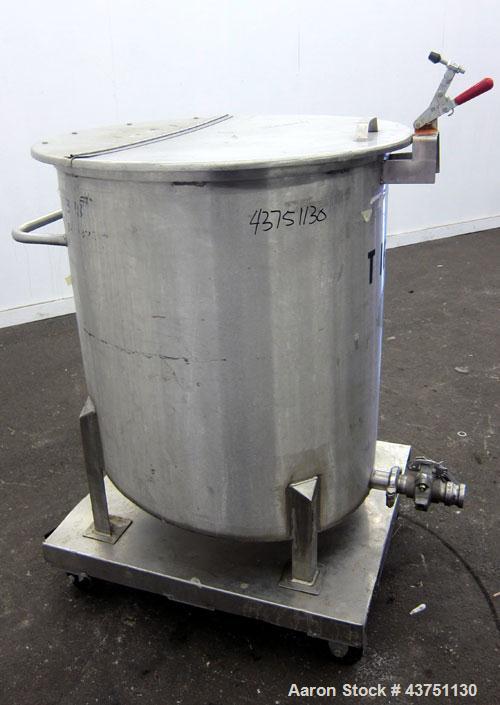 Used Water Cooling Corporation Tank, 100 Gallons, 304 Stainless Steel, Vertical. Approximately 31" diameter x 34" straight side.  Flat top with a bolt-on hinged cover, 6" sloped bottom.  2" Tri-clamp...