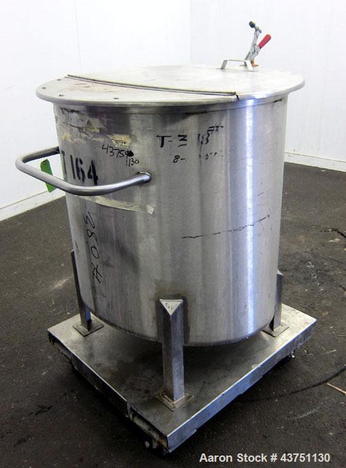 Used Water Cooling Corporation Tank, 100 Gallons, 304 Stainless Steel, Vertical. Approximately 31" diameter x 34" straight side.  Flat top with a bolt-on hinged cover, 6" sloped bottom.  2" Tri-clamp...