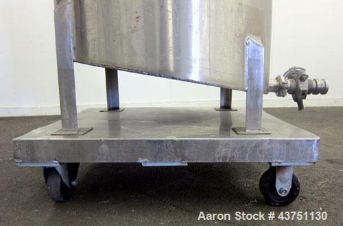 Used Water Cooling Corporation Tank, 100 Gallons, 304 Stainless Steel, Vertical. Approximately 31" diameter x 34" straight side.  Flat top with a bolt-on hinged cover, 6" sloped bottom.  2" Tri-clamp...