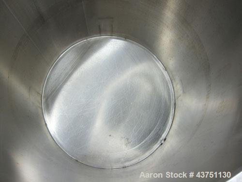 Used Water Cooling Corporation Tank, 100 Gallons, 304 Stainless Steel, Vertical. Approximately 31" diameter x 34" straight side.  Flat top with a bolt-on hinged cover, 6" sloped bottom.  2" Tri-clamp...