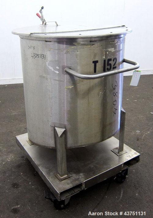 Used Water Cooling Corporation Tank, 100 Gallons, 304 Stainless Steel, Vertical. Approximately 31" diameter x 34" straight side.  Flat top with a bolt-on hinged cover, 6" sloped bottom.  2" Tri-clamp...
