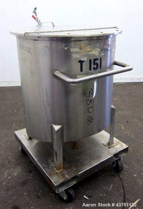 Used Water Cooling Corporation Tank, 100 Gallons, 304 Stainless Steel, Vertical. Approximately 31" diameter x 34" straight side.  Flat top with a bolt-on hinged cover, 6" sloped bottom.  2" Tri-clamp...